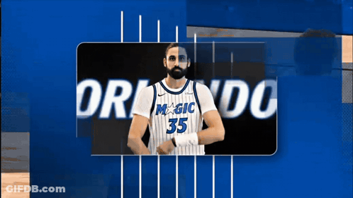 A Man With A Beard Wearing A Jersey That Says Magic 35 GIF