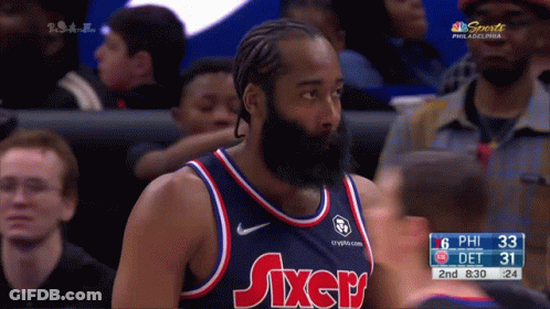 A Man With A Beard Wearing A Jersey That Says Sixers GIF