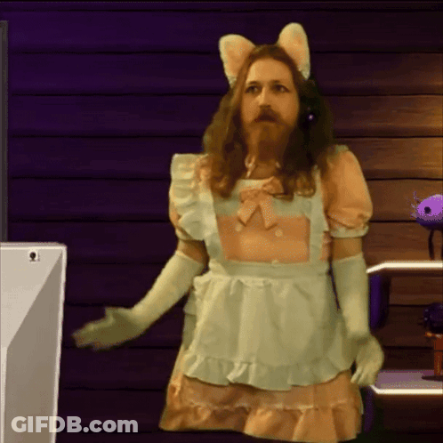 A Man With A Beard Wearing A Maid Costume GIF