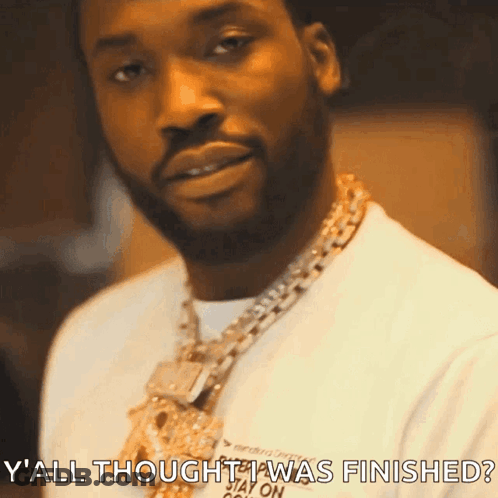 A Man With A Beard Wearing A Necklace And A White Shirt Says Y All Thought I Was Finished ? GIF