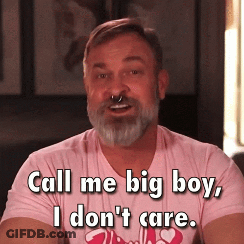 A Man With A Beard Wearing A Pink Shirt That Says Call Me Big Boy I Don 'T Care GIF