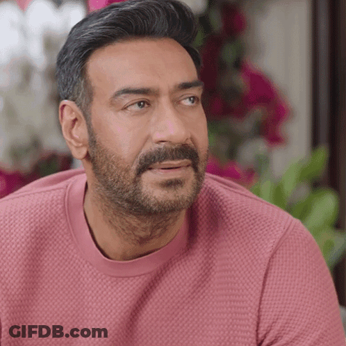 A Man With A Beard Wearing A Pink Shirt GIF