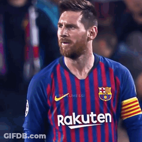 A Man With A Beard Wearing A Rakuten Shirt GIF