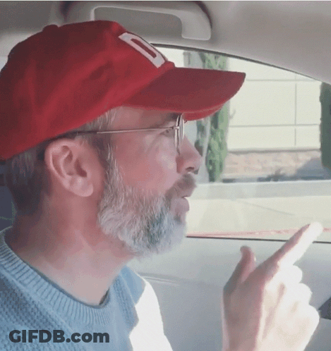 A Man With A Beard Wearing A Red Hat With A Letter D On It GIF
