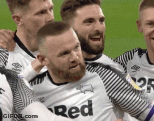 A Man With A Beard Wearing A Red Jersey GIF