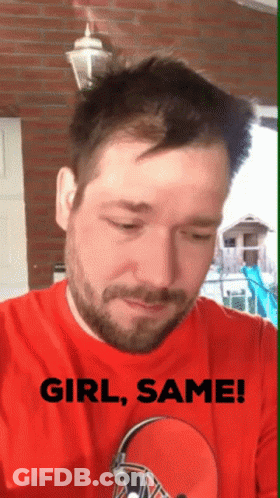 A Man With A Beard Wearing A Red Shirt That Says " Girl Same " GIF