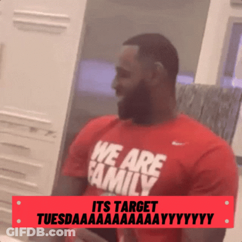 A Man With A Beard Wearing A Red Shirt That Says We Are Family GIF