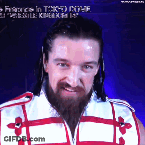 A Man With A Beard Wearing A Red White And Blue Outfit GIF
