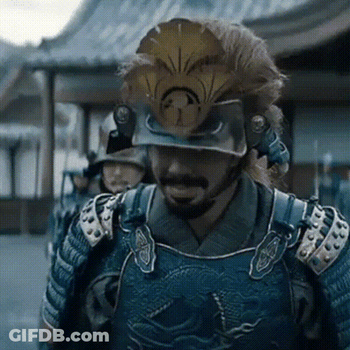 A Man With A Beard Wearing A Samurai Armor And Helmet GIF