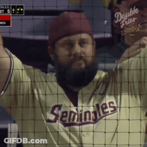 A Man With A Beard Wearing A Seminoles Jersey GIF