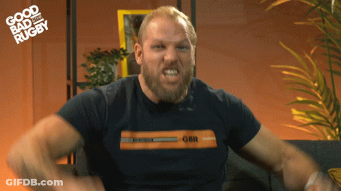 A Man With A Beard Wearing A Shirt That Says Gbr GIF