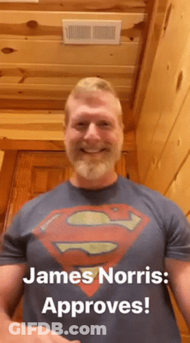 A Man With A Beard Wearing A Superman T-Shirt Says James Norris Approves GIF
