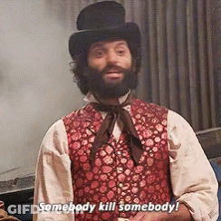 A Man With A Beard Wearing A Top Hat And A Vest Says Somebody Kill Somebody GIF