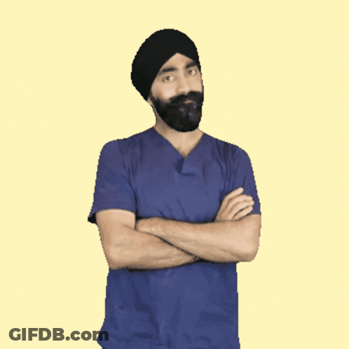 A Man With A Beard Wearing A Turban And A Blue Shirt GIF