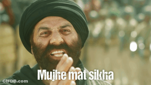 A Man With A Beard Wearing A Turban Says ' Muje Mat Sikha ' At The Bottom GIF
