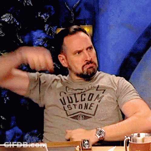 A Man With A Beard Wearing A Volcom Stone T-Shirt GIF