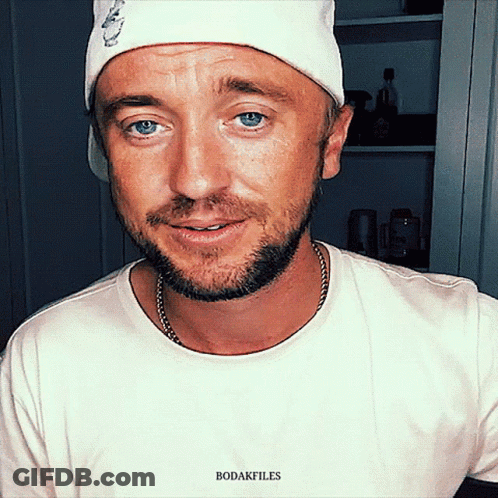 A Man With A Beard Wearing A White Hat And A White T-Shirt With The Word Bodakfiles On It GIF