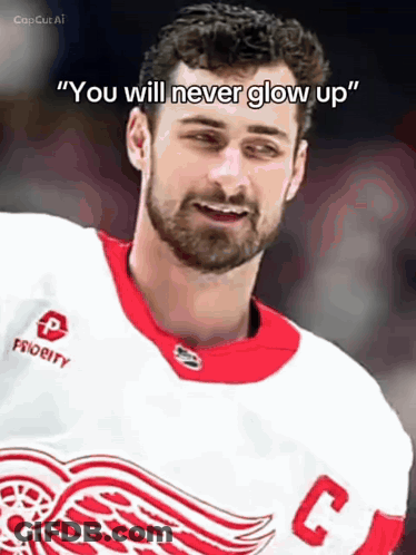 A Man With A Beard Wearing A White Jersey With The Letter C On It GIF