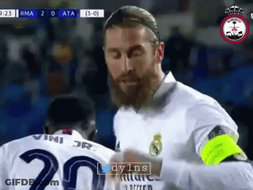A Man With A Beard Wearing A White Jersey With The Number 20 On It GIF