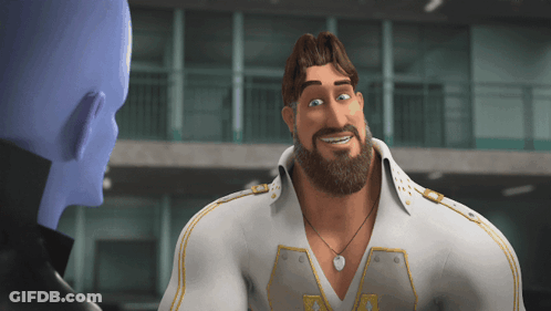 A Man With A Beard Wearing A White Shirt With The Letter V On The Front GIF