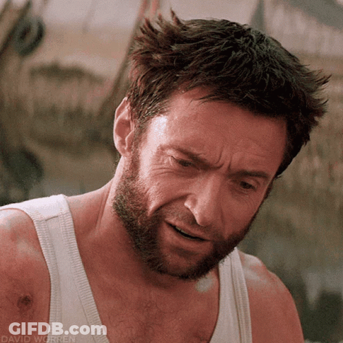A Man With A Beard Wearing A White Tank Top With David Worren Written On The Bottom GIF