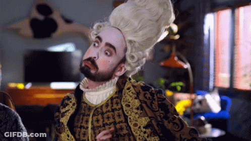 Bearded Man Wearing Wig And Coat GIF