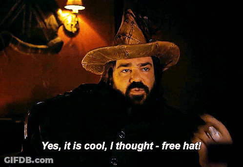 A Man With A Beard Wearing A Wizard Hat Says " Yes It Is Cool I Thought Free Hat " GIF