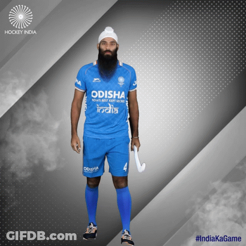 A Man With A Beard Wearing An Odisha Jersey GIF