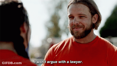 A Man With A Beard Wearing An Orange Shirt Says I Won 'T Argue With A Lawyer GIF