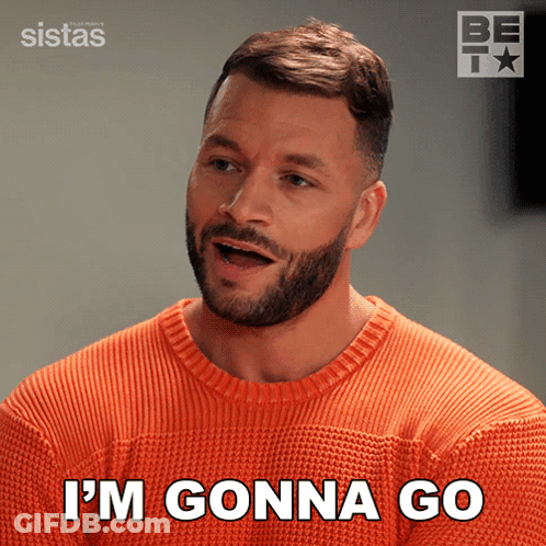 A Man With A Beard Wearing An Orange Sweater Says I 'M Gonna Go GIF