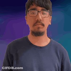 A Man With A Beard Wearing Glasses And A Black Shirt GIF