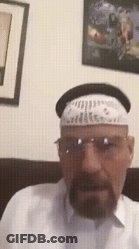 A Man With A Beard Wearing Glasses And A Headband GIF