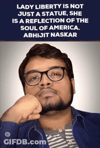 A Man With A Beard Wearing Glasses And A Quote About Lady Liberty Is Not Just A Statue GIF