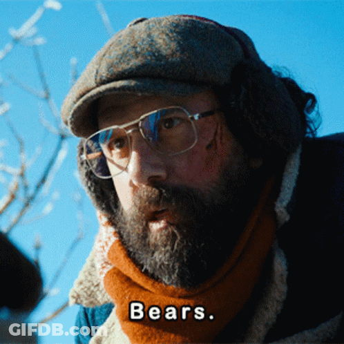 A Man With A Beard Wearing Glasses And Ear Muffs Says " Bears " GIF