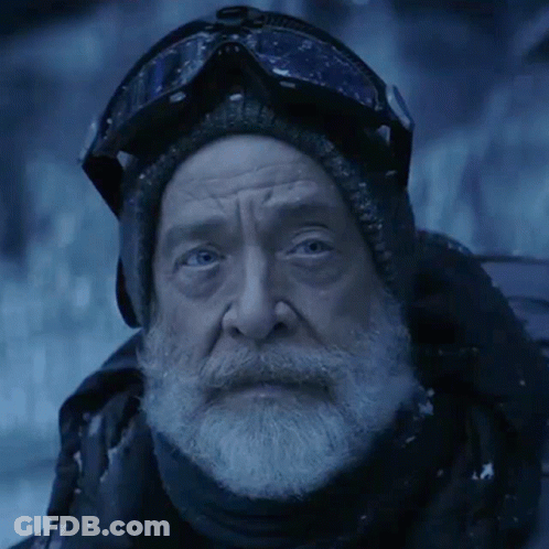 A Man With A Beard Wearing Goggles And A Scarf GIF