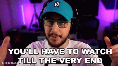 A Man With A Beard Wearing Headphones And A Hat Says You 'Ll Have To Watch Till The Very End GIF