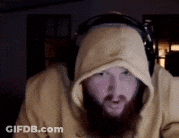 A Man With A Beard Wearing Headphones And A Hooded Sweatshirt GIF
