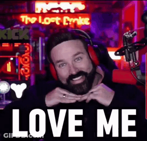 A Man With A Beard Wearing Headphones And A Microphone Says Love Me GIF