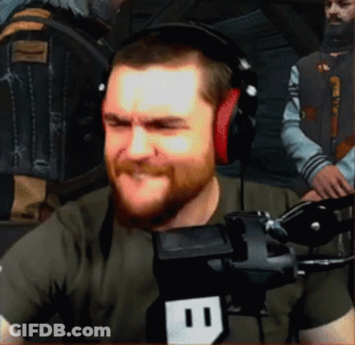 A Man With A Beard Wearing Headphones And A Microphone With The Number 11 On It GIF