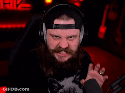 A Man With A Beard Wearing Headphones And A Tattoo On His Arm That Says Flyer GIF