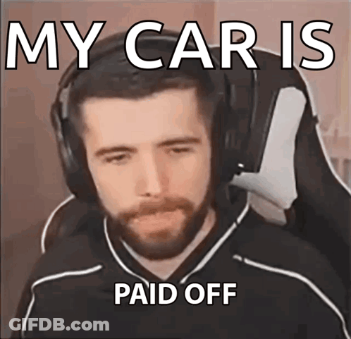 A Man With A Beard Wearing Headphones Is Making A Meme About His Car Being Paid Off GIF