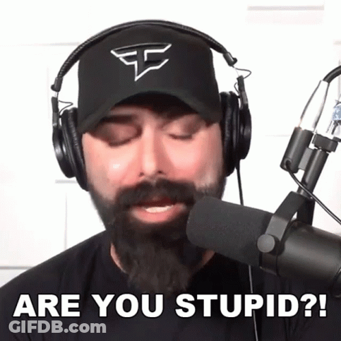 A Man With A Beard Wearing Headphones Says Are You Stupid GIF