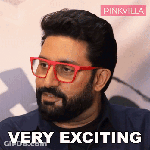 A Man With A Beard Wearing Red Glasses And The Words Very Exciting GIF