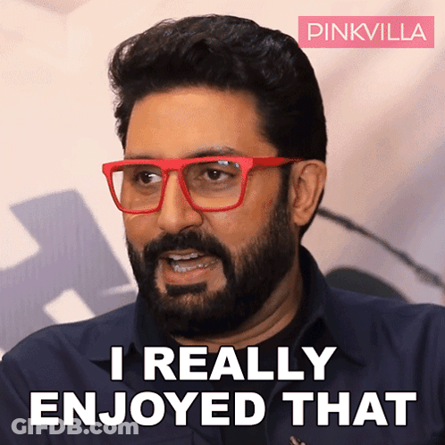A Man With A Beard Wearing Red Glasses Says " I Really Enjoyed That " GIF