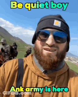 A Man With A Beard Wearing Sunglasses And A Beanie Says " Be Quiet Boy " GIF