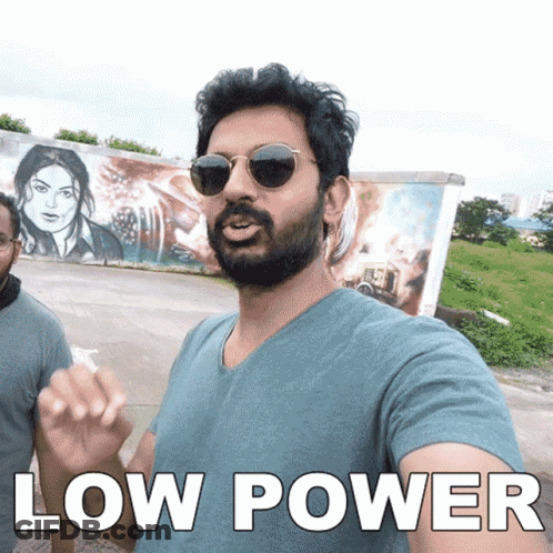 A Man With A Beard Wearing Sunglasses And A Shirt That Says Low Power On It GIF