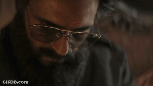 A Man With A Beard Wearing Sunglasses And The Words You Think GIF