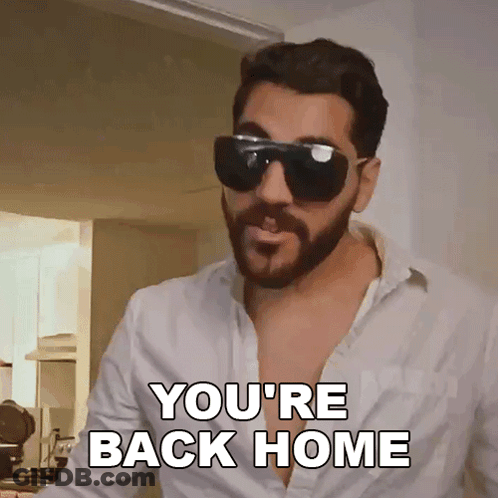 A Man With A Beard Wearing Sunglasses Says You 'Re Back Home GIF