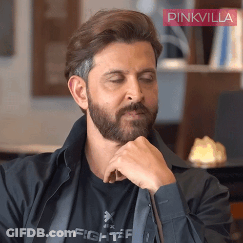 A Man With A Beard Wears A Black Shirt That Says Fighter GIF