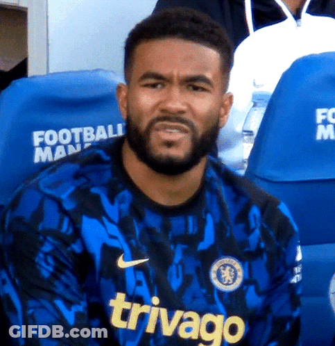 A Man With A Beard Wears A Blue Jersey That Says Trivago GIF